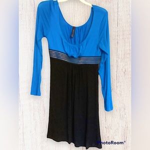 A Junior color block knit dress. Purchased at HOT Topic. In pre owned condition